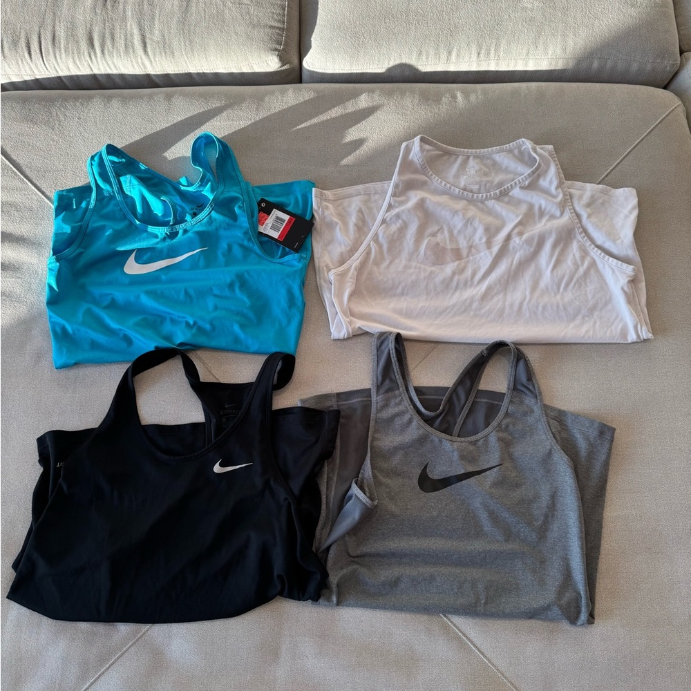 Nike Performance Tank Tops in Blue, White, Black, and Gray
